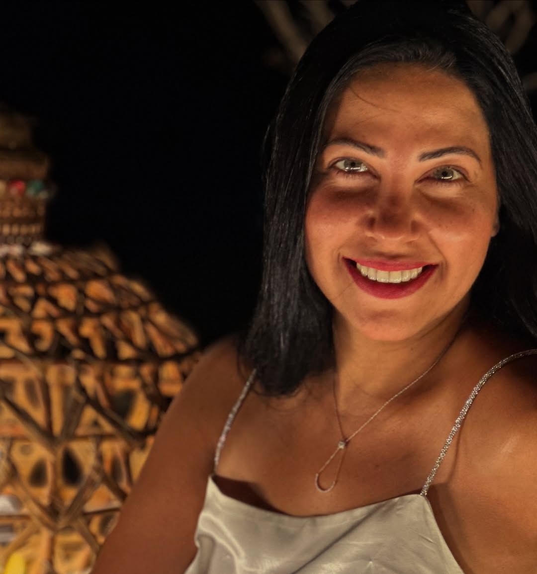 May be an image of 1 person and smiling