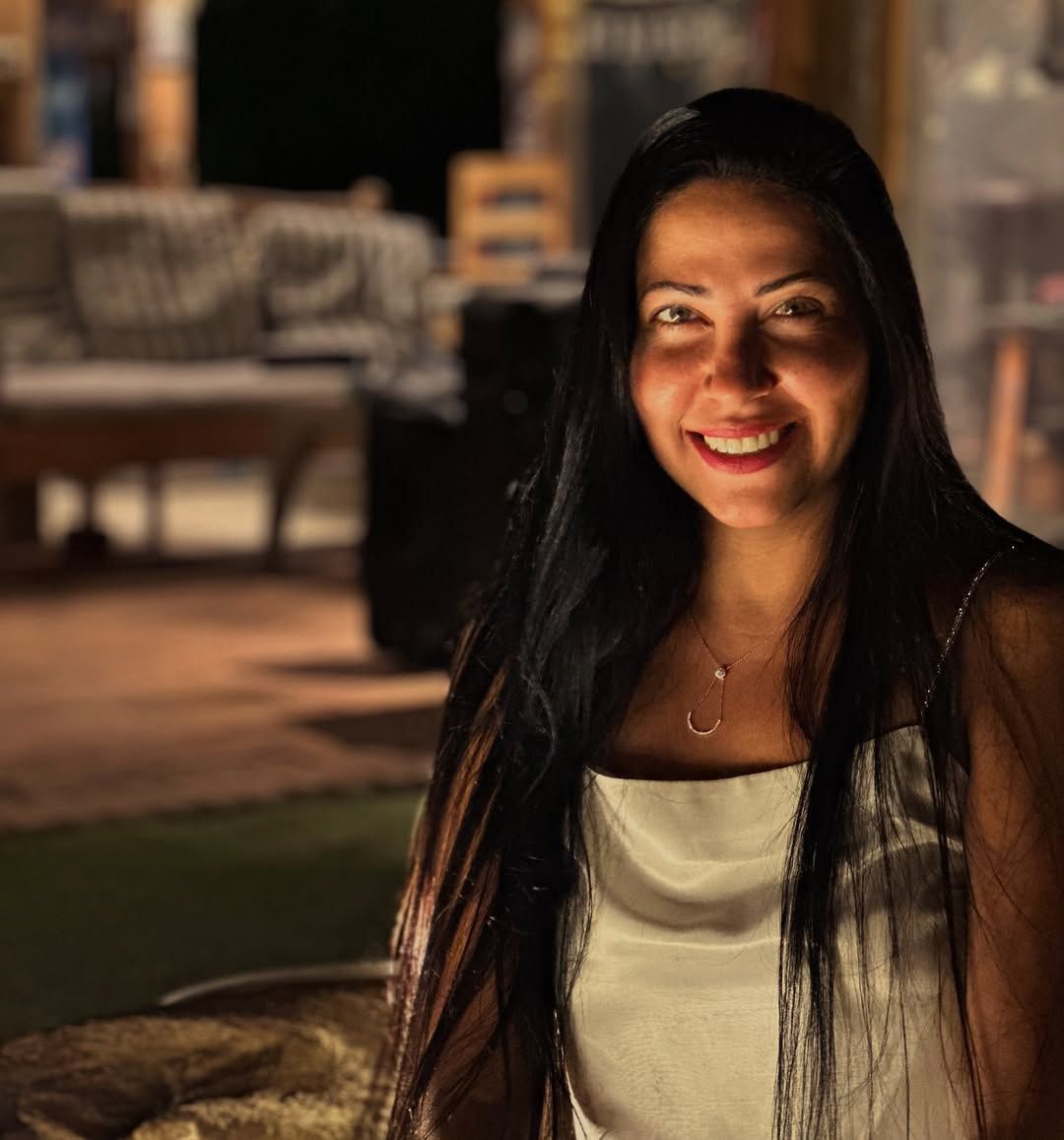 May be an image of 1 person and smiling
